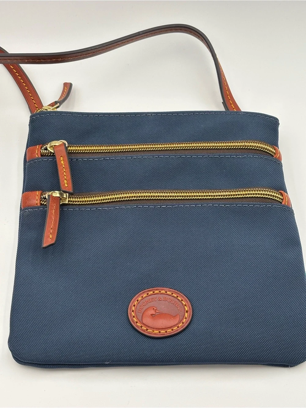 Dooney & Bourke Triple Zip Navy Crossbody with Brown Leather Trim